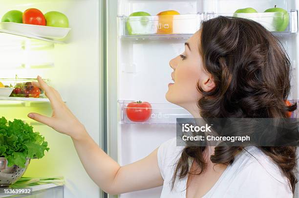 Fridge With Food Stock Photo - Download Image Now - Refrigerator, One Woman Only, Women