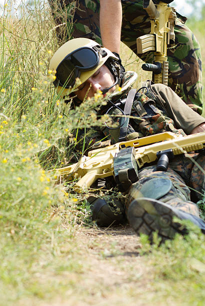 istock Soldier being dragged away from the battlefield 153640298