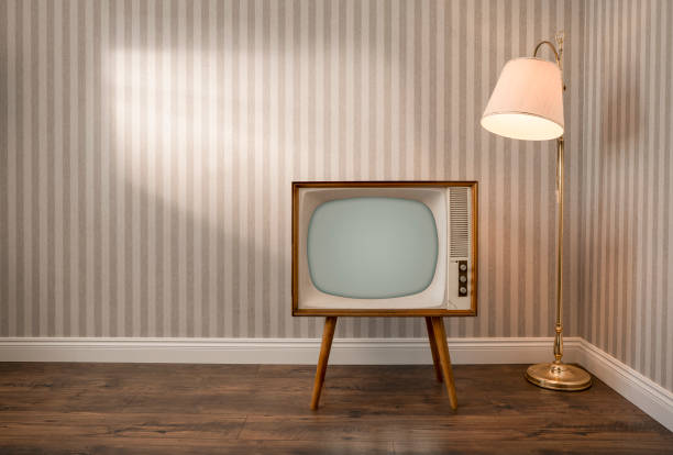 istock Retro TV set in empty room 1536407025