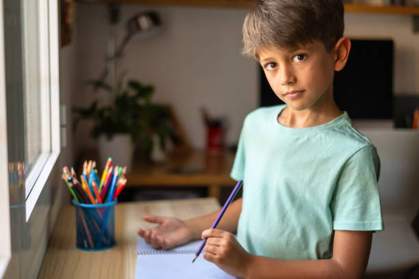 istock Beautiful School Boy Looking At Camera. Education 1536416992
