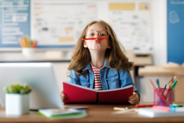 istock Girl doing homework or online education. 1536462729