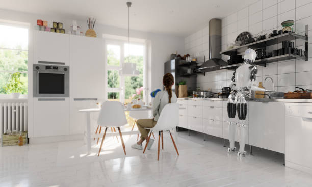 istock Robot maid washing dishes in the kitchen 1536496845