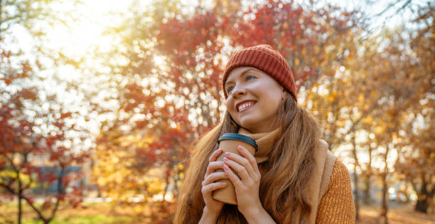 istock Woman is walking in the park. 1536498541