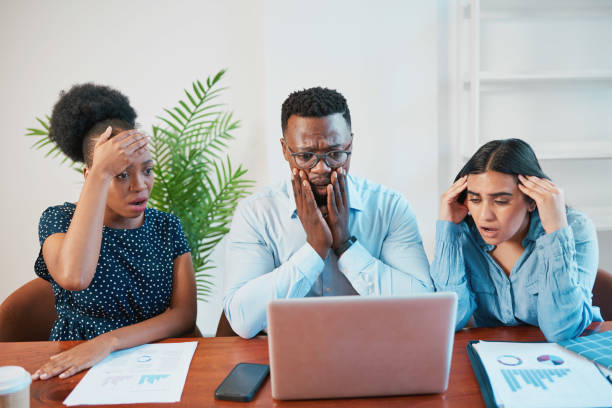 istock Three colleagues look shocked at laptop screen, project failure, crash, bad news 1536530456