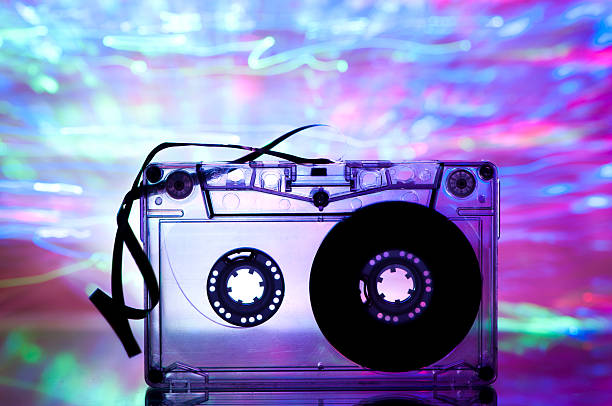 istock Cassette tape and multicolored lights 153653807