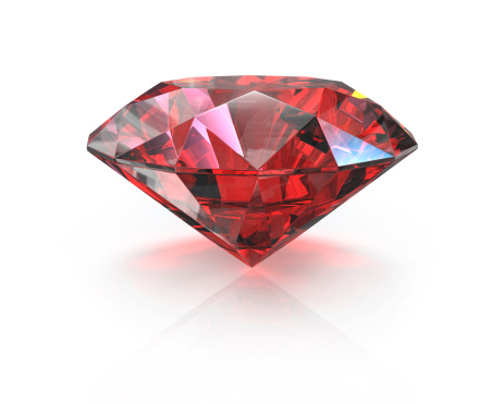 Round cut ruby, isolated on white background