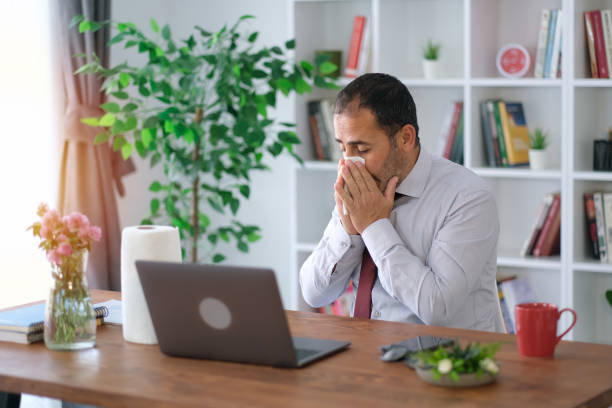 istock man has a cold and is sneezing 1536567635