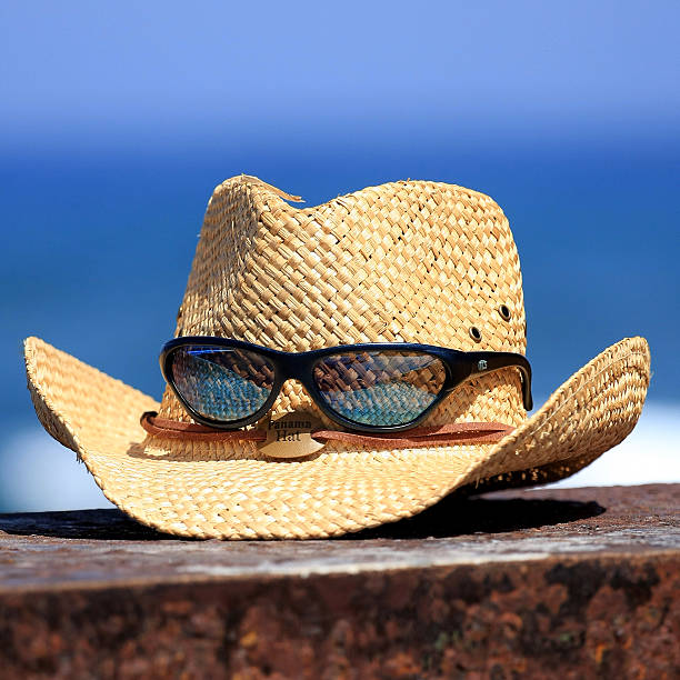 Summer hat and glasses stock photo