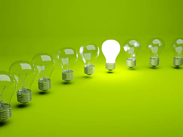 istock Row of light bulbs with one lit up 153658457