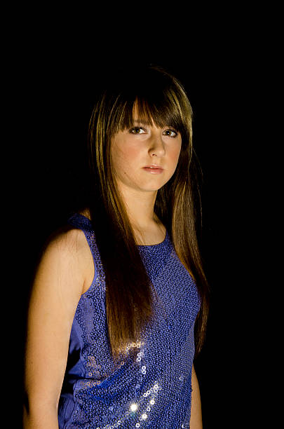 istock Young attractive girl dark background 153658476