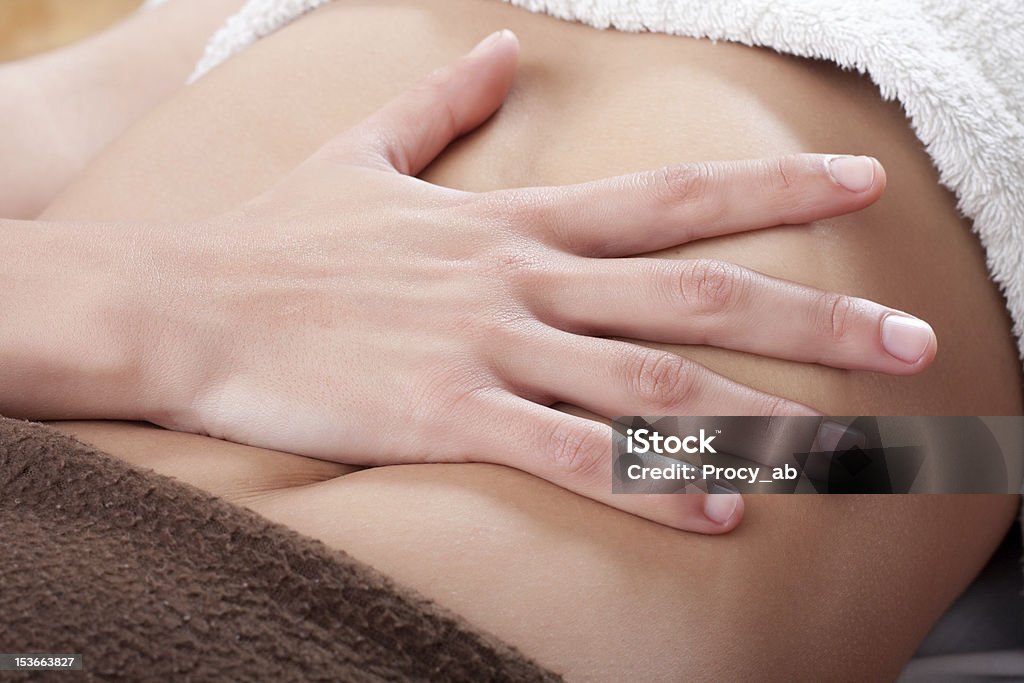 Massieren den Bauch - Lizenzfrei Chiropraktiker Stock-Foto