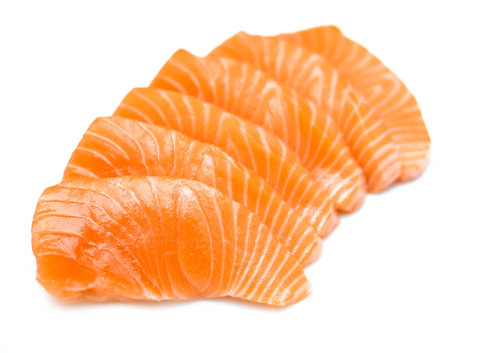 Sliced raw fatty salmon (Salmon sashimi) isolated on white background