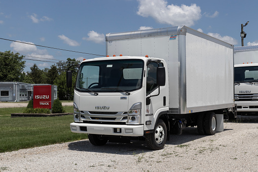 Muncie - July 10, 2023: Isuzu NPR HD truck. Isuzu offers the NPR as a box or flatbed truck, or a dump truck model.
