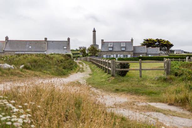 istock Lighthouse surrounded by greenery in Bretagne, France 1536692752