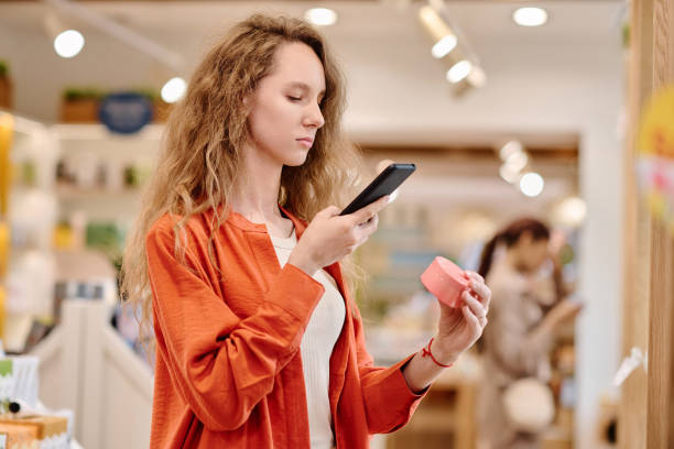 istock Customer making photo of cream on smartphone 1536714230