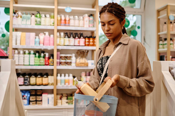 istock Woman choosing lotion in the store 1536716377