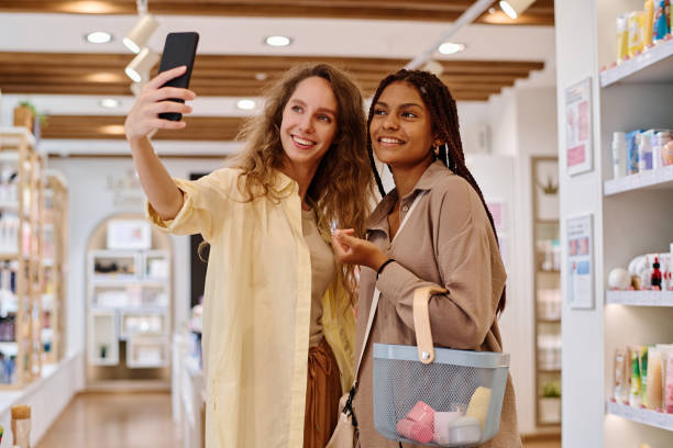 istock Girlfriends making selfie portrait in the mall 1536720136
