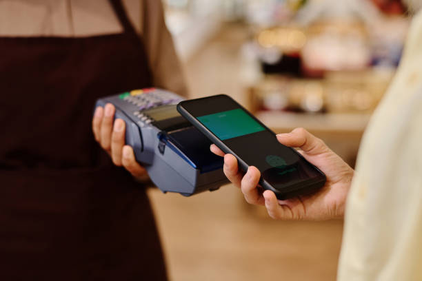 istock Customer paying online with smartphone 1536721750
