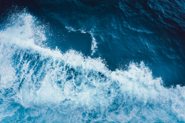 istock View from above turquoise ocean waves background. 1536751312
