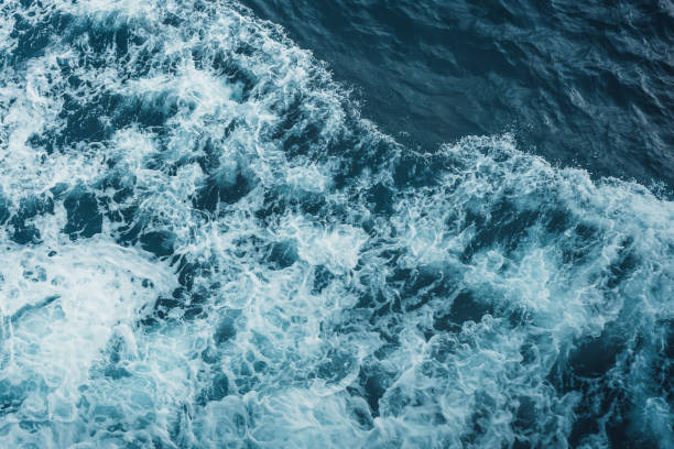 istock View from above turquoise ocean waves background. 1536754511