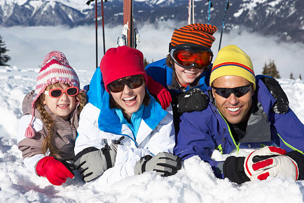 istock Family Having Fun On Ski Holiday In Mountains 153676180