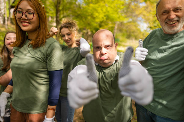 istock Man with down syndrome giving a thumbs up for environmental conservation 1536766966