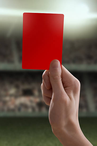 istock Red card with hand from referee giving a penalty 153676773