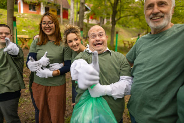 istock Man with down syndrome giving a thumbs up for environmental conservation 1536767998