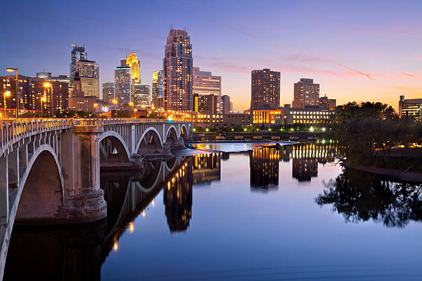 Minneapolis. Image of Minneapolis downtown skyline at sunset. minnesota stock pictures, royalty-free photos & images