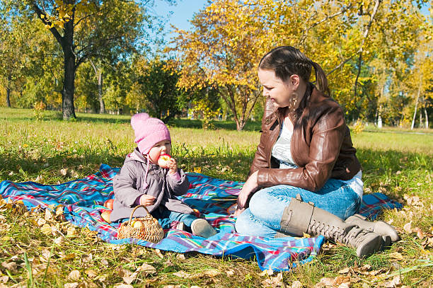 istock The young woman with daughter on walk 153679644