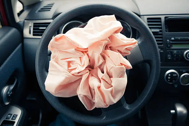 Airbag explodes on steering wheel