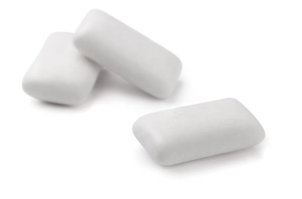 Three pieces  of white chewing gum isolated on white