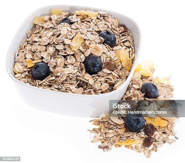 Mixed Muesli In A Bowl Isolated On White Stock Photo - Download Image Now - Berry Fruit, Blueberry, Bowl