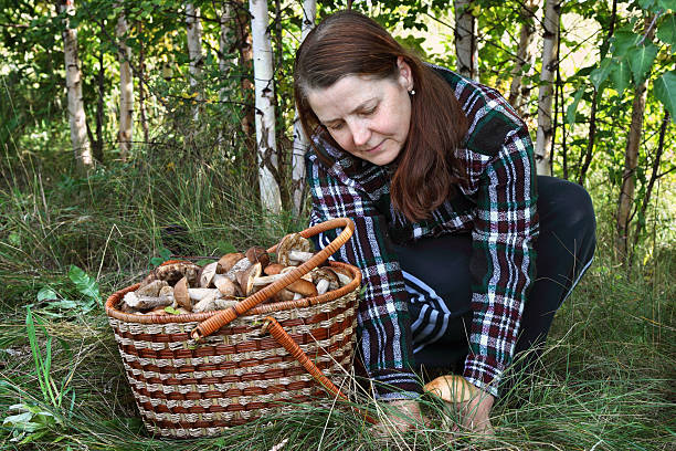 istock Woman and mushrooms 153685894