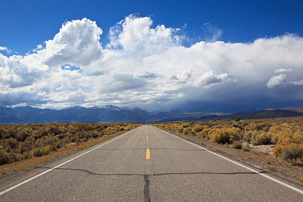 istock Desert highway to stormy mountains 153685957