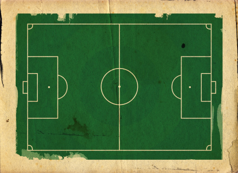 Grunge style llustration of a football (soccer) pitch on aged textured paper.