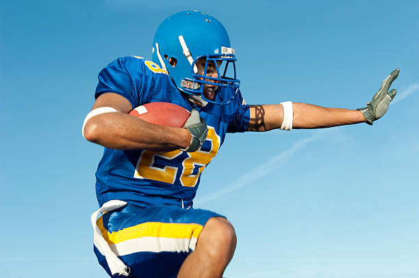 istock Football Player with Ball 153686606