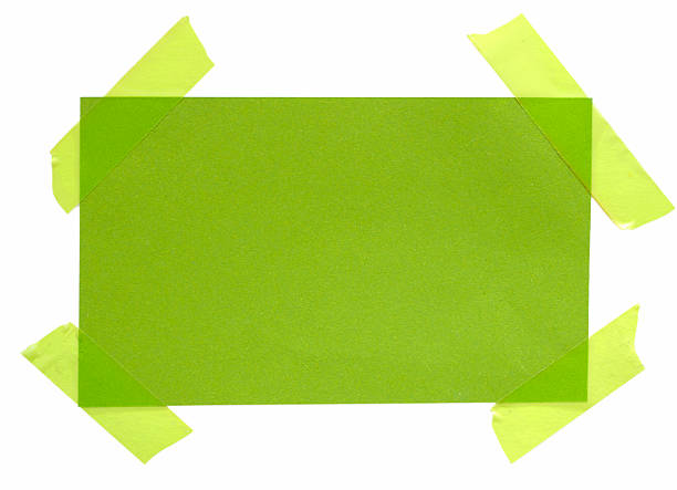 istock green paper note with sticky tape 153686937
