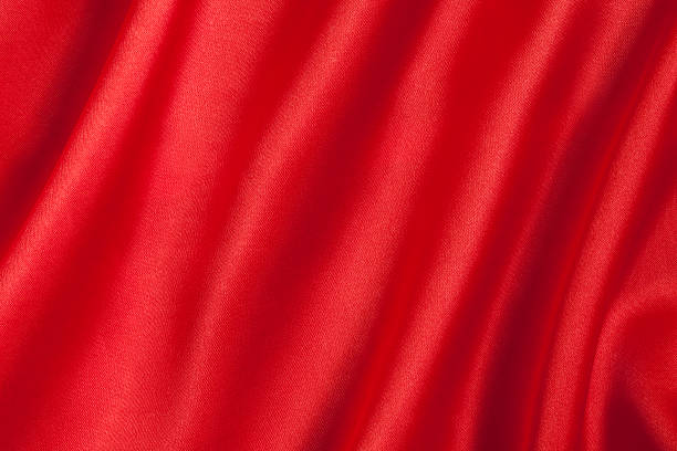 istock elegant and smooth red satin background 153687103