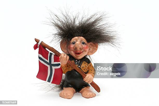 A Smiling Troll Doll With Wild Hair Holds The Flag Of Norway Stock Photo - Download Image Now