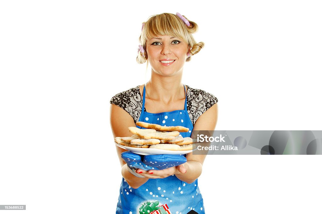 Młoda kobieta gotowa pliki cookie na święta - Zbiór zdjęć royalty-free (Białe tło)