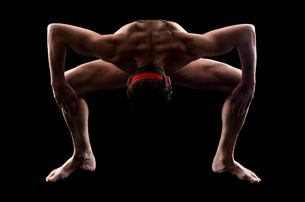 Athlete men and yoga Naked athlete men exercising gymnastics and yoga, front view yoga nudist silhouette naked stock pictures, royalty-free photos & images