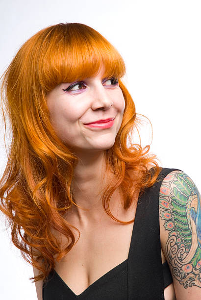 istock Smiling Red Head Woman with Tattoo 153688809