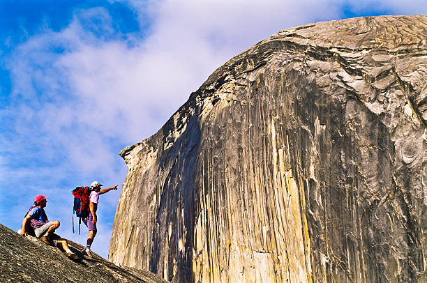 Man mountain climbing and climbing cliff.