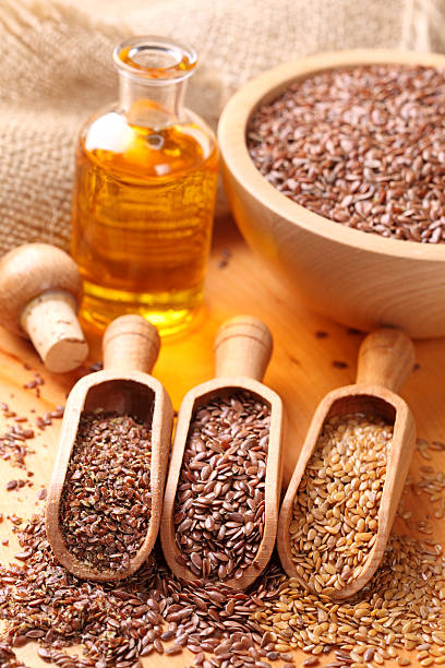 istock Linseed oil and flax seeds 153689603