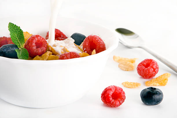 Cereal with milk and fruits stock photo