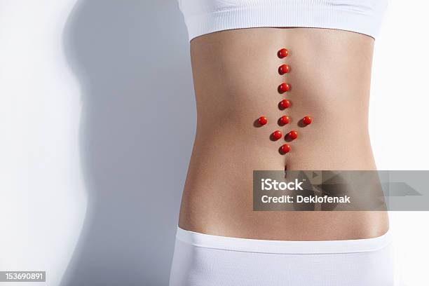 Red Arrow On The Stomach Stock Photo - Download Image Now - Abdomen, Adult, Adults Only