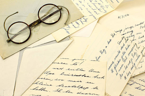 istock pair of old glasses on some handwritten letters 153691268