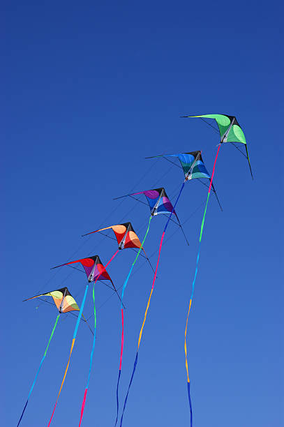 istock Kites against a vivid blue sky 153693217