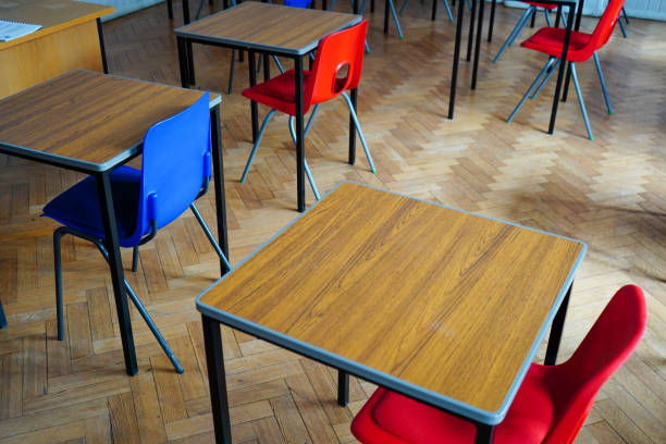 istock Red school classroom chairs and desks 1536933015